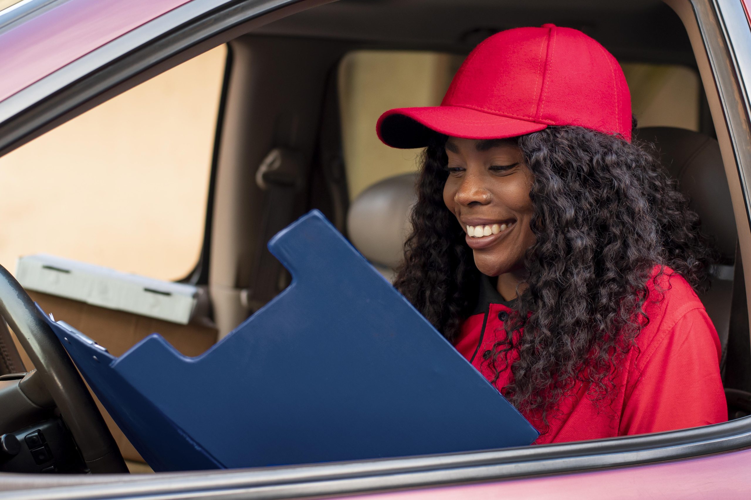close-up-delivery-person-looking-papers